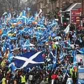 Tens of thousands of Scottish independence supporters march through Glasgow. Picture: John Devlin