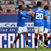 Joe Aribo celebrates with James Tavernier after scoring to make it 3-0 during a Scottish Premiership match between Rangers and Ross County at Ibrox, on January 23, 2021, in Glasgow, Scotland. (Photo by Rob Casey / SNS Group)