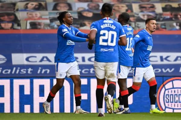 Joe Aribo celebrates with James Tavernier after scoring to make it 3-0 during a Scottish Premiership match between Rangers and Ross County at Ibrox, on January 23, 2021, in Glasgow, Scotland. (Photo by Rob Casey / SNS Group)