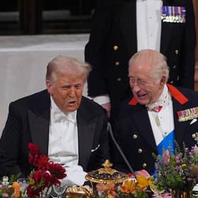 US President Donald Trump speaks to King Charles III during a state banquet at Windsor Castle in September 2025 (Picture: Yui Mok - WPA Pool/Getty Images)