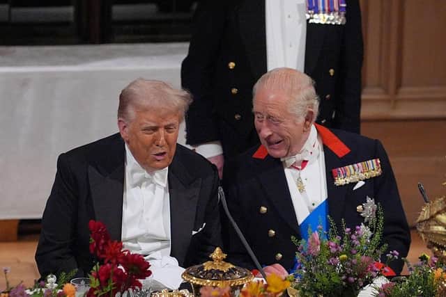 US President Donald Trump speaks to King Charles III during a state banquet at Windsor Castle in September 2025 (Picture: Yui Mok - WPA Pool/Getty Images)