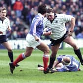 Peter Walton in action (right) against France in the 1994 Five Nations, with current Scotland coach Gregor Townsend on the left. Picture: SNS