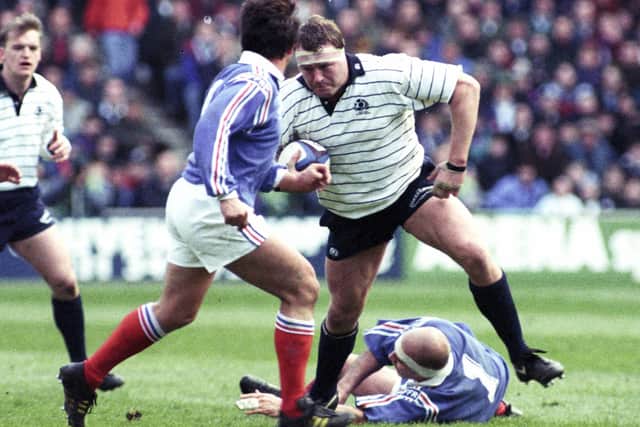 Peter Walton in action (right) against France in the 1994 Five Nations, with current Scotland coach Gregor Townsend on the left. Picture: SNS