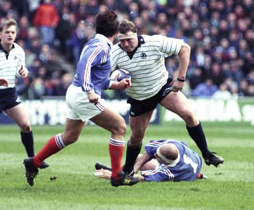 Peter Walton in action (right) against France in the 1994 Five Nations, with current Scotland coach Gregor Townsend on the left. Picture: SNS