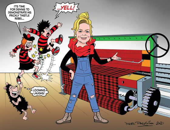 A cartoon showing Dennis and Minnie the Minx larking about next to a weaving loom
