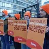 The BMA in Scotland has threatened to "undertake the kind of industrial action seen elsewhere in the UK", such as the junior doctors' strike pictured above in England.