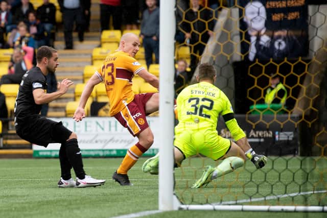 One to treasure for Motherwell's Liam Grimshaw as he nets his first senior goal to give the Fir Park side victory in Livingston. Photo by Craig Foy / SNS Group