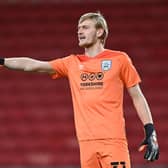 Ryan Schofield is on loan at Hibs from Huddersfield for the rest of the season.