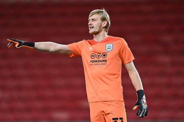 Ryan Schofield is on loan at Hibs from Huddersfield for the rest of the season.
