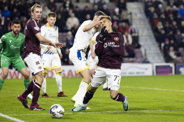 Hearts' Kenneth Vargas goes down in the box during the match against St Johnstone.