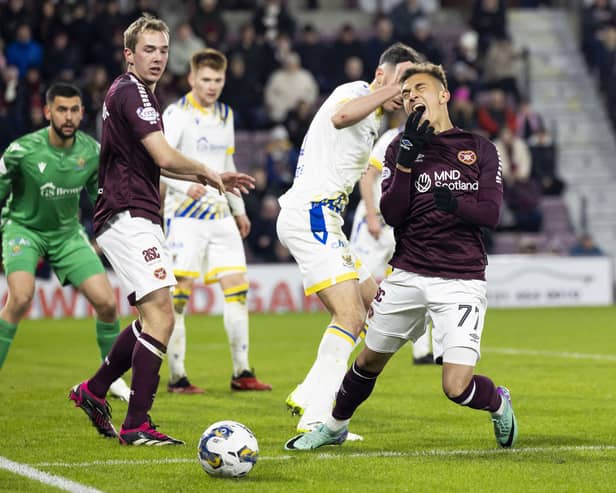 Hearts' Kenneth Vargas goes down in the box during the match against St Johnstone.