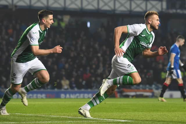 Ryan Porteous celebrates after putting Hibs 1-0 ahead at Ibrox. (Photo by Craig Foy / SNS Group)