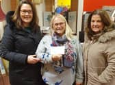 Shona Watson of Buchan Giving Tree SCIO receives the cheque from Sheena Gordon and Alison Morgan of Apex.