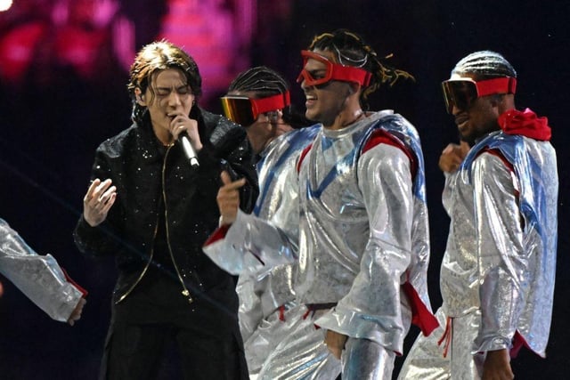 South Korean singer Jung Kook performs during the opening ceremony ahead of the Qatar World Cup.