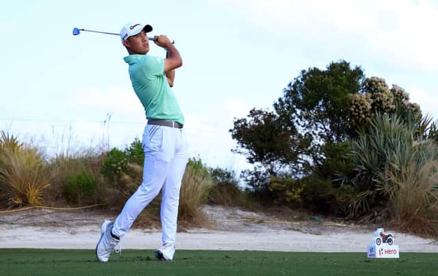 Collin Morikawa hits his tee shot on the second hole during the second round of the Hero World Challenge at Albany Golf Course in the Bahamas. Mike Ehrmann/Getty Images.