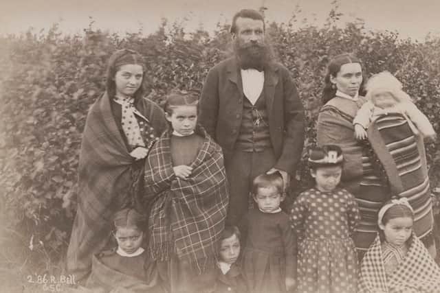 The  Métis are one of three indigenous nations recognised in Canada with their ancestry descended from European traders, mainly French and Scottish, and First Nations women. Here, a mother holds their infant in a cradle board, traditionally used by First Nations peoples with the shawls, worn by several of the women and girls, reflecting Métis culture. PIC: Robert Bell. Library and Archives Canada