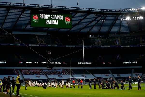 Some players stand and others take the knee ahead of the England v Scotland Six Nations match at Twickenham. Picture: Adrian Dennis/AFP via Getty Images