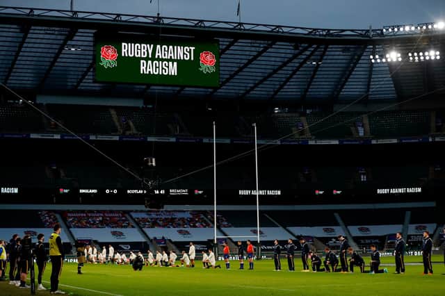 Some players stand and others take the knee ahead of the England v Scotland Six Nations match at Twickenham. Picture: Adrian Dennis/AFP via Getty Images