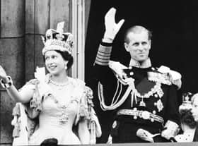 The Queen and Prince Philip wave to the crowd following her coronation at Westminster Abbey on 2 June, 1953 (Picure: INTERCONTINENTALE/AFP via Getty Images)