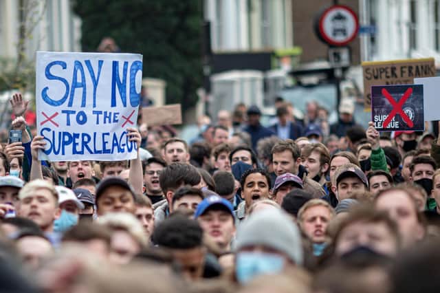 Chelsea fans protest against the Super League outside Stamford Bridge.