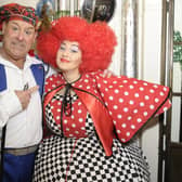 Andy Gray as Buttons and his daughter Clare as a Wicked Sister meet backstage during Cinderella at the King's