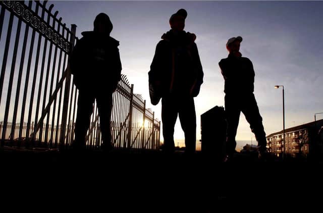 Silhouette of youths.