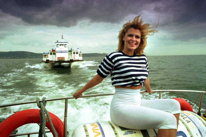 Jacqui Ward on one of Forth Ferries vessels doing the Granton to Burntisland run as a storm gathers on the company's first birthday in April 1992