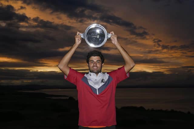 Spain's Eugenio Chacarra shows off the trophy after winning the inaugural St Andrews Bay Championship at Fairmont St Andrews. Picture: Paul Lakatos/Asian Tour.