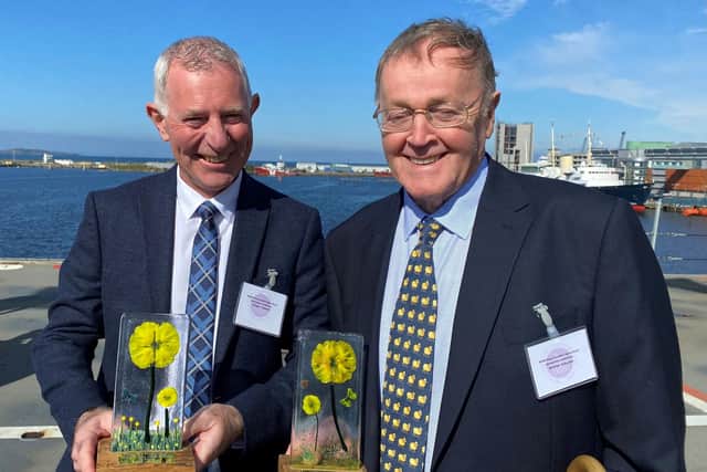 Funny farming books author Andrew Arbuckle (right) is pictured with fellow award-winner Gregor Caldwell.