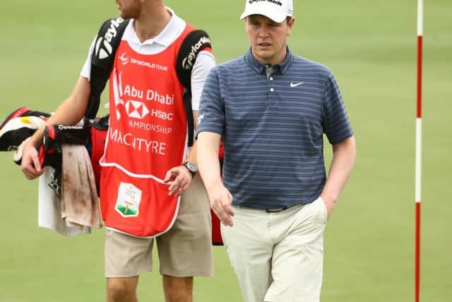 Bob MacIntyre has old caddie Greg Milne standing in for Mike Thomson in this week's Rolex Series event. Picture: Francois Nel/Getty Images.
