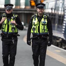 Emergency services responded to reports of an injured woman on the tracks.
