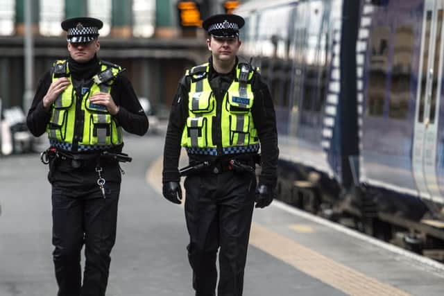 Emergency services responded to reports of an injured woman on the tracks.