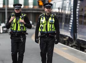 Emergency services responded to reports of an injured woman on the tracks.