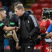 Aberdeen manager Barry Robson speaks to referee Nick Walsh at full time after the 1-1 draw with Rangers at Pittodrie. (Photo by Craig Williamson / SNS Group)