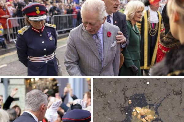 A man has been detained by police for allegedly throwing eggs at the King and Queen Consort.