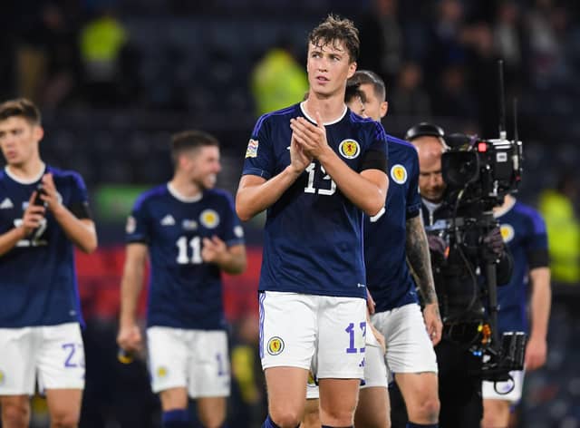 Scotland's Jack Hendry applauds fans at full time after the win against Ukraine.
