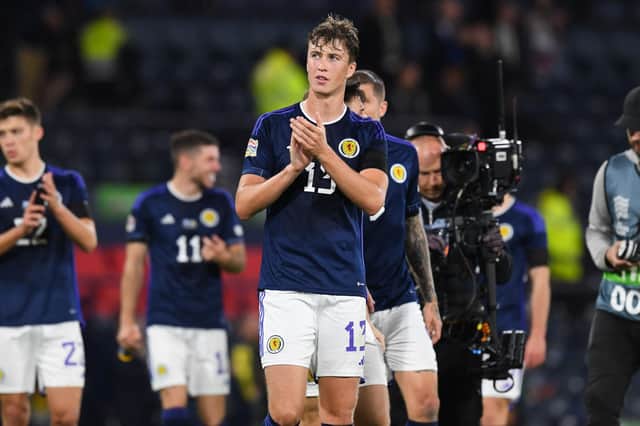 Scotland's Jack Hendry applauds fans at full time after the win against Ukraine.