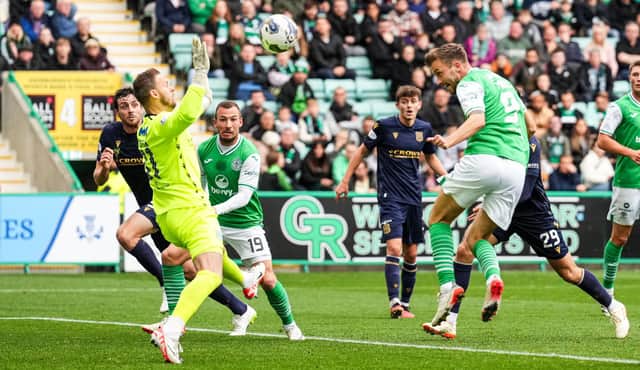 Hibs striker Dylan Vente heads the ball on target during the 0-0 draw with Dundee. (Photo by Simon Wootton / SNS Group)