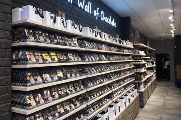 A wall of chocolate inside the Hotel Chocolat branch in Fort Kinnaird, Edinburgh.