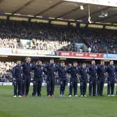 Scotland line up to sign Flower of Scotland at a recent rugby match at BT Murrayfield.