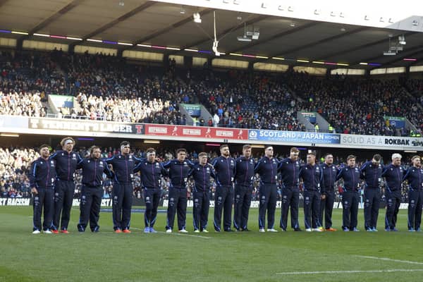 Scotland line up to sign Flower of Scotland at a recent rugby match at BT Murrayfield.