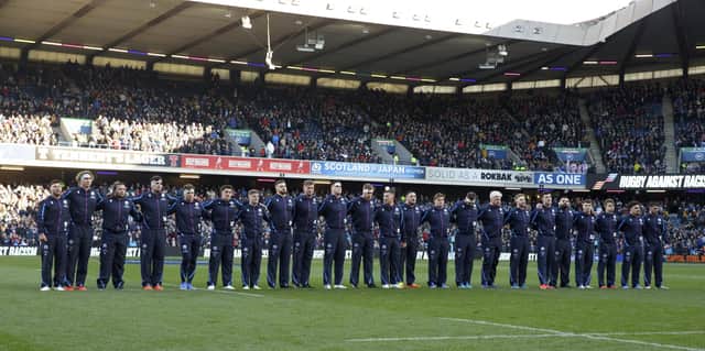 Scotland line up to sign Flower of Scotland at a recent rugby match at BT Murrayfield.