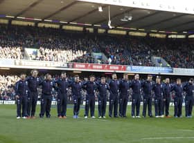 Scotland line up to sign Flower of Scotland at a recent rugby match at BT Murrayfield.