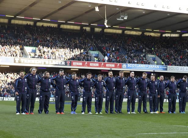 Scotland line up to sign Flower of Scotland at a recent rugby match at BT Murrayfield.