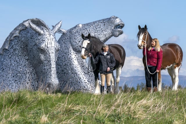 Amanda Merchant (left) and Kelly Stirling (right) with Clydesdale horses Maggie May and Iona with the Kelpies in the background.