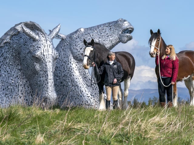 Amanda Merchant (left) and Kelly Stirling (right) with Clydesdale horses Maggie May and Iona with the Kelpies in the background.
