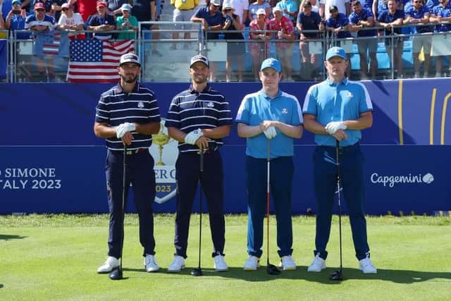 Max Homa and Wyndham Clark of Team United States and Bob MacIntyre and Justin Rose of Team Europe pose for a photo on the first tee. Picture: Andrew Redington/Getty Images.
