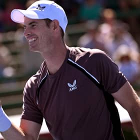 Andy Murray smiles after his win over Dominic Thiem at the Kooyong Classic ahead of the Australian Open, which starts this weekend. (Photo by WILLIAM WEST/AFP via Getty Images)