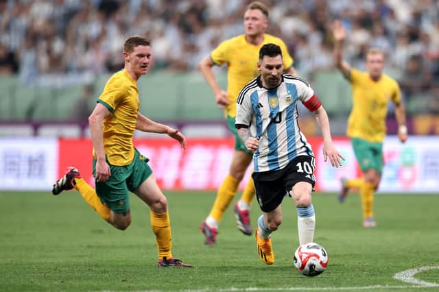Lionel Messi of Argentina controls the ball against Kye Rowles of Australia during the 2-0 win over the Socceroos.