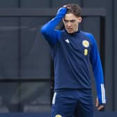 Aaron Hickey trains for Scotland.